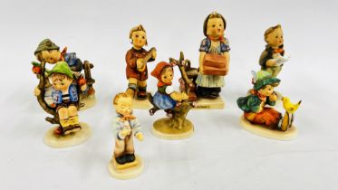 A GROUP OF 8 VINTAGE GOEBEL HUMMEL FIGURINES OF CHILDREN.