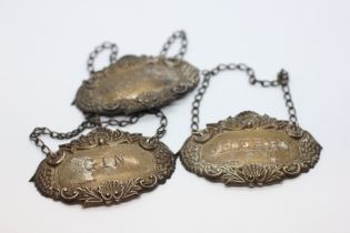 A GROUP OF THREE SILVER SPIRIT DECANTER LABELS GIN, SCOTCH AND SHERRY BIRMINGHAM ASSAY, B & CO.
