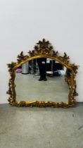 A HIGHLY DECORATIVE REPRODUCTION GILT FRAMED MIRROR, W 120CM X H 117CM.