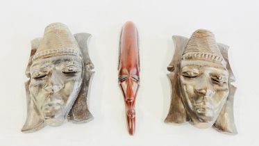 THREE AFRICAN ETHNIC CARVED HEADS TO INCLUDE A PAIR OF WALL MASKS.