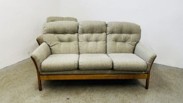 A MODERN SOLID LIGHT OAK FRAMED SUITE COMPRISING OF A 3 SEATER SOFA AND MATCHING ARMCHAIR