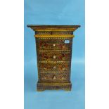 A SMALL HARD WOOD 4 DRAWER CHEST WITH HAND PAINTED INDIAN STYLE DECORATION - H 63 X D 28 X W 40CM.