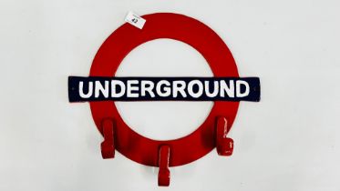 (R) UNDERGROUND SIGN COAT RACK.