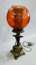 AN ELABORATE MODERN OIL LAMP WITH CRANBERRY TYPE GLASS SHADE AND CRYSTAL DROPS - WIRING REMOVED.