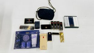 A BASKET CONTAINING A SELECTION OF BRANDED MAKE UP TO INCLUDE EXAMPLES MARKED ESTEE LAUDER AND