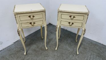 A PAIR OF CONTINENTAL DESIGN TWO DRAWER BEDSIDE TABLES.