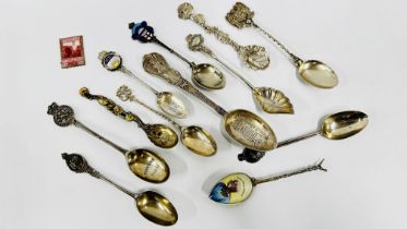 GROUP OF ELEVEN VARIOUS SILVER SOUVENIR SPOONS INCLUDING ONE WITH ENAMELLED DECORATION BRITISH