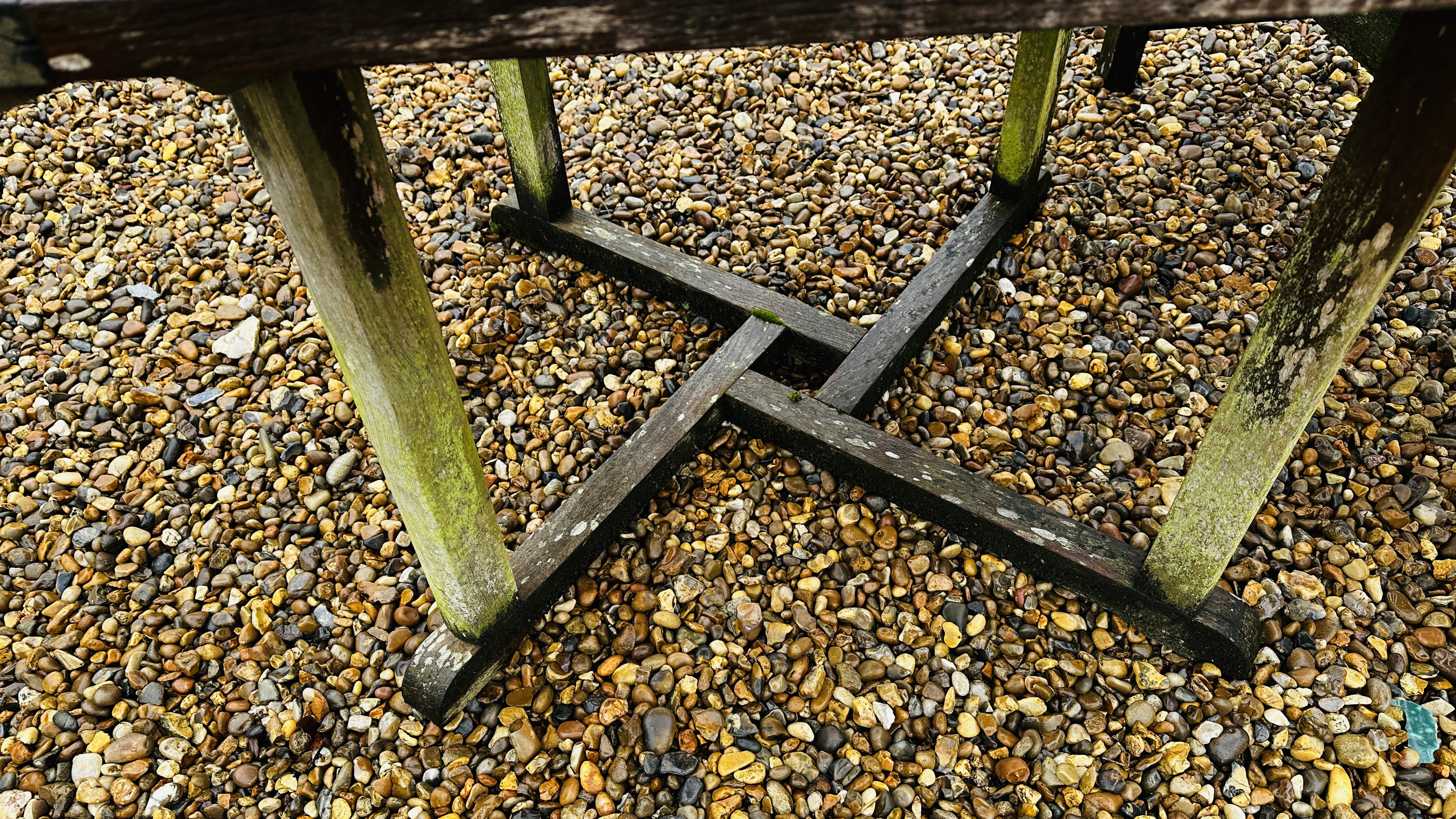 A HARDWOOD GARDEN BENCH LENGTH 120CM AND HARDWOOD GARDEN TABLE - WEATHERED CONDITION, 90 X 90CM. - Image 4 of 7