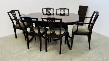 REPRODUCTION TWIN PEDESTAL MAHOGANY FINISH DINING TABLE ALONG WITH A SET OF 6 CHAIRS.