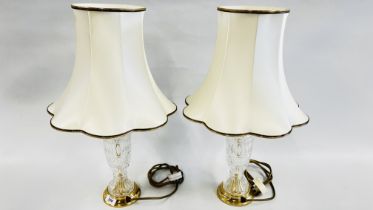 PAIR OF LEAD CRYSTAL TABLE LAMPS WITH CREAM SHADES, OVERALL HEIGHT 58CM - SOLD AS SEEN.