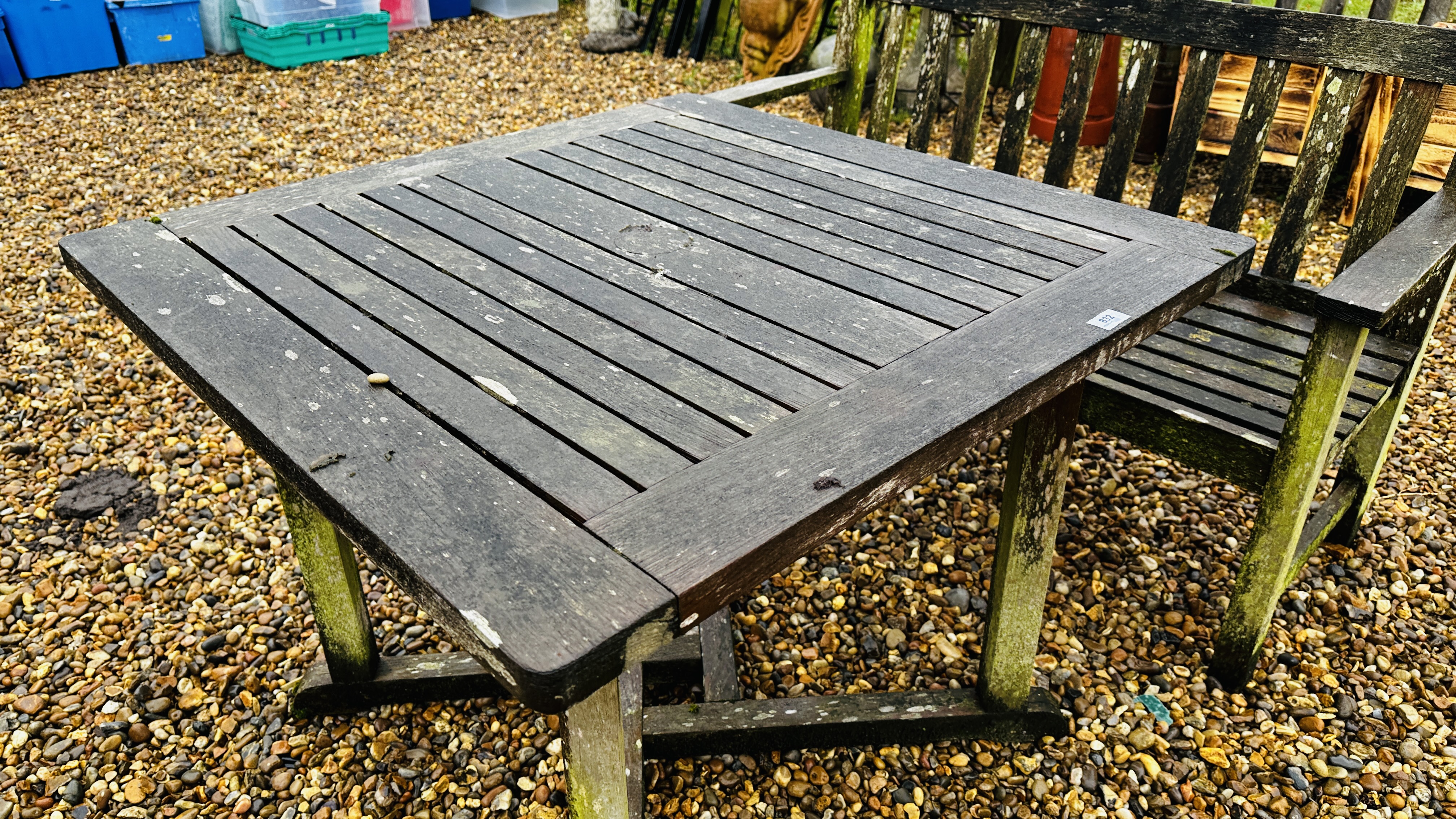A HARDWOOD GARDEN BENCH LENGTH 120CM AND HARDWOOD GARDEN TABLE - WEATHERED CONDITION, 90 X 90CM. - Image 2 of 7