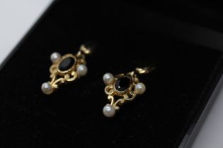 PAIR OF 9CT GOLD GARNET AND PEARL DESIGNER EARRINGS.