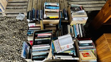 12 X BOXES ASSORTED BOOKS TO INCLUDE COOKERY, STAMP COLLECTING, TRAVEL, REFERENCE AND MODERN NOVELS.