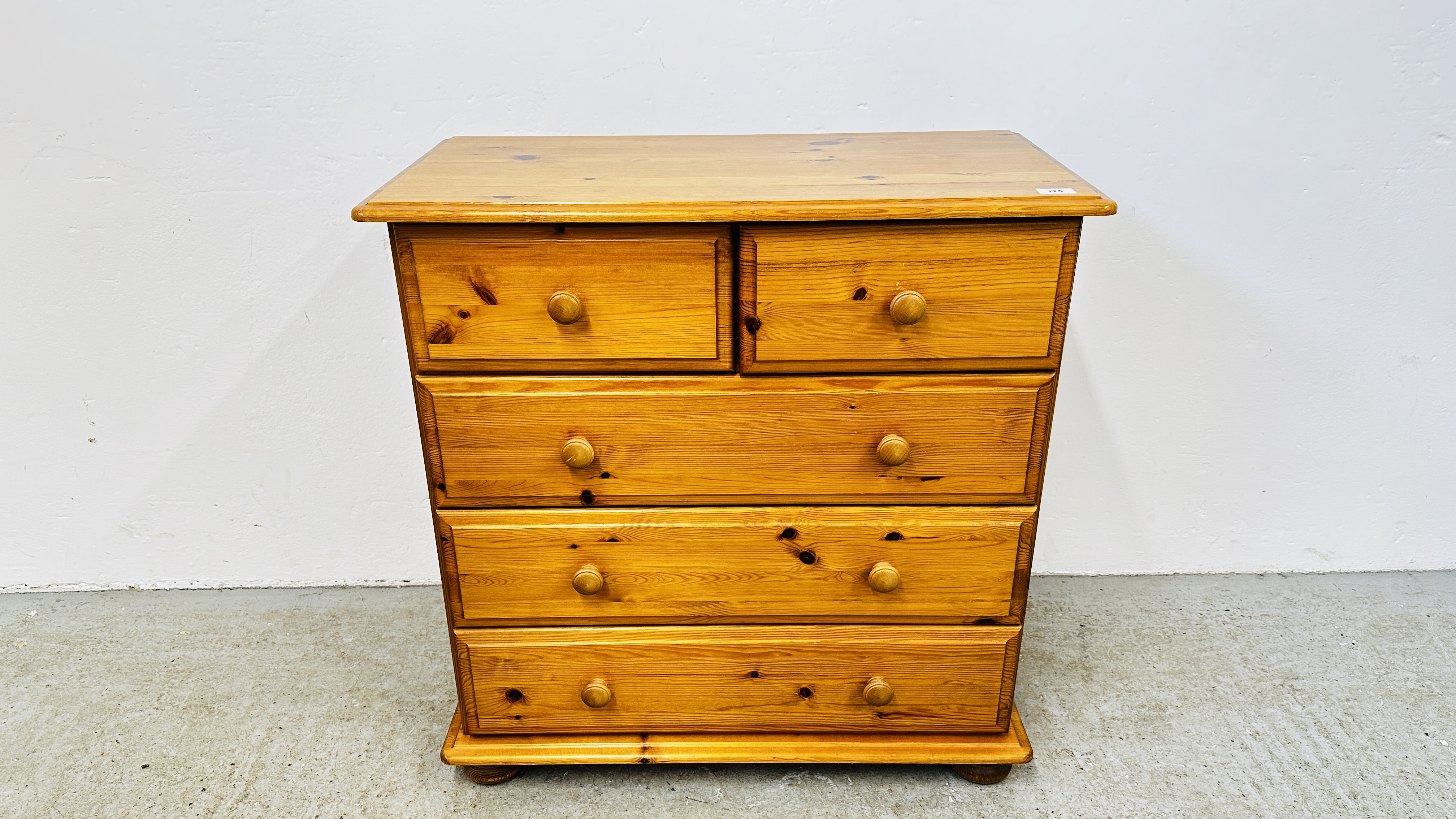 A MODERN HONEY PINE CHEST OF DRAWERS, 2 SHORT OVER 3 LONG, W 81CM, D 41CM, H 83CM.