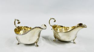 A PAIR OF SOLID SILVER SAUCE BOATS, BIRMINGHAM 1930, RUBBED MAKERS MARK.
