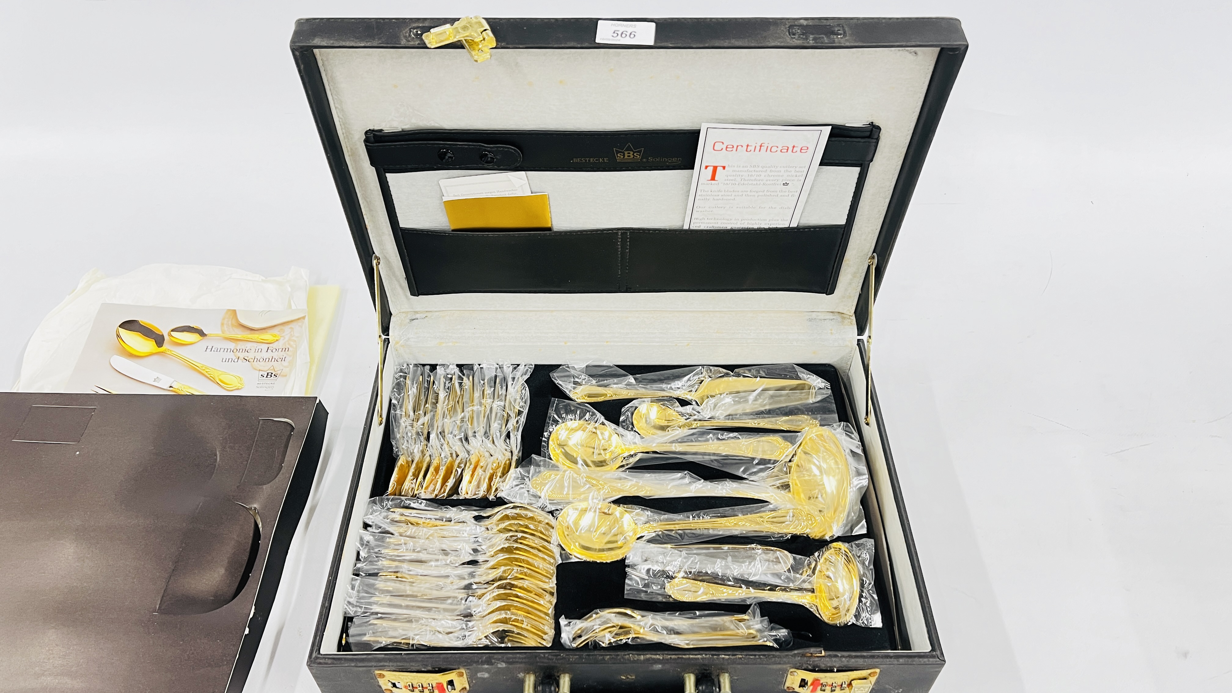 A CASED CANTEEN OF SBS SOLINGEN GILDED CUTLERY (12 PLACE SETTING). - Image 2 of 3