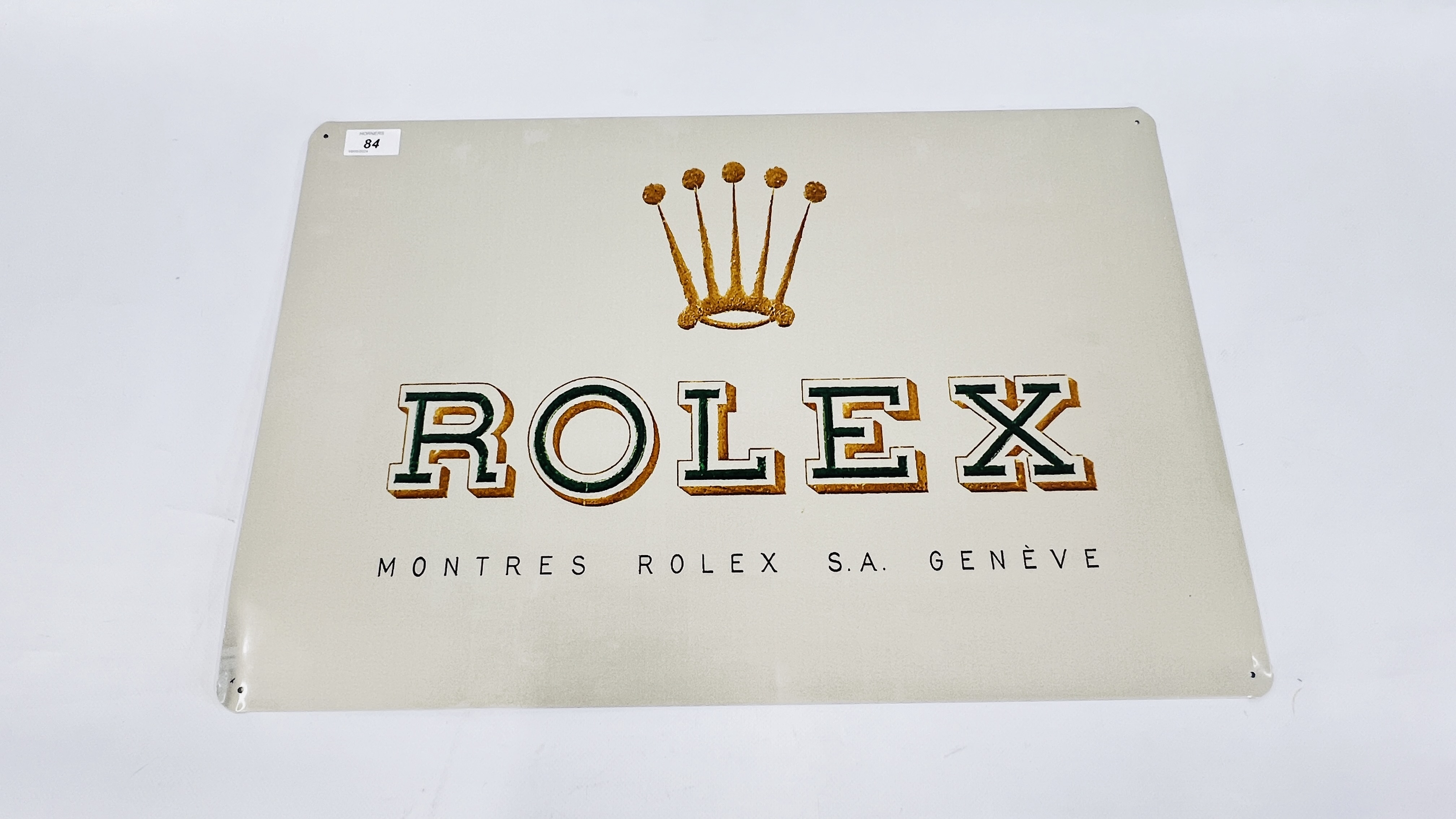 A REPRODUCTION TIN "ROLEX" ADVERTISING SIGN W 60 X H 40CM.