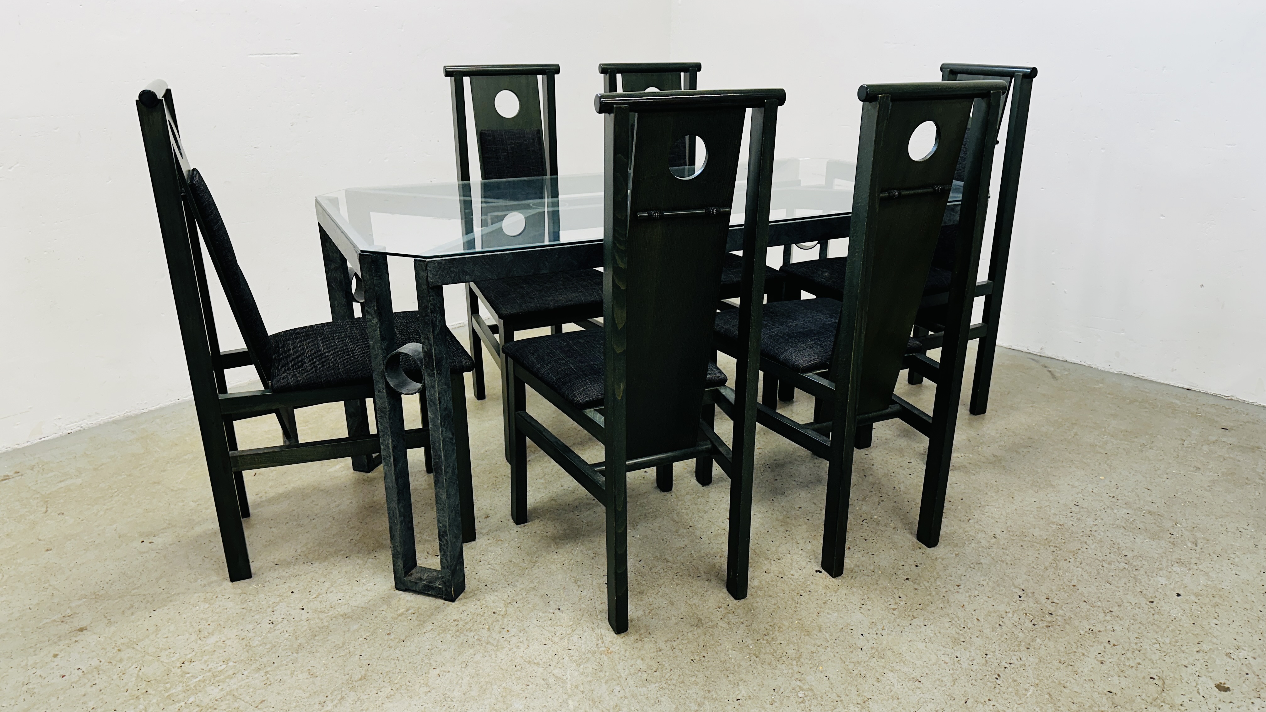 A DESIGNER MODERN METAL CRAFT DINING TABLE WITH GLASS TOP 155CM X 80CM ACCOMPANIED BY A SET OF SIX