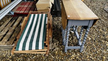 AN OAK BARLEY TWIST GATELEG TABLE AND A BEECH WOOD RUSH SEATED STOOL AND 2 FOLDING TRADITIONAL DECK