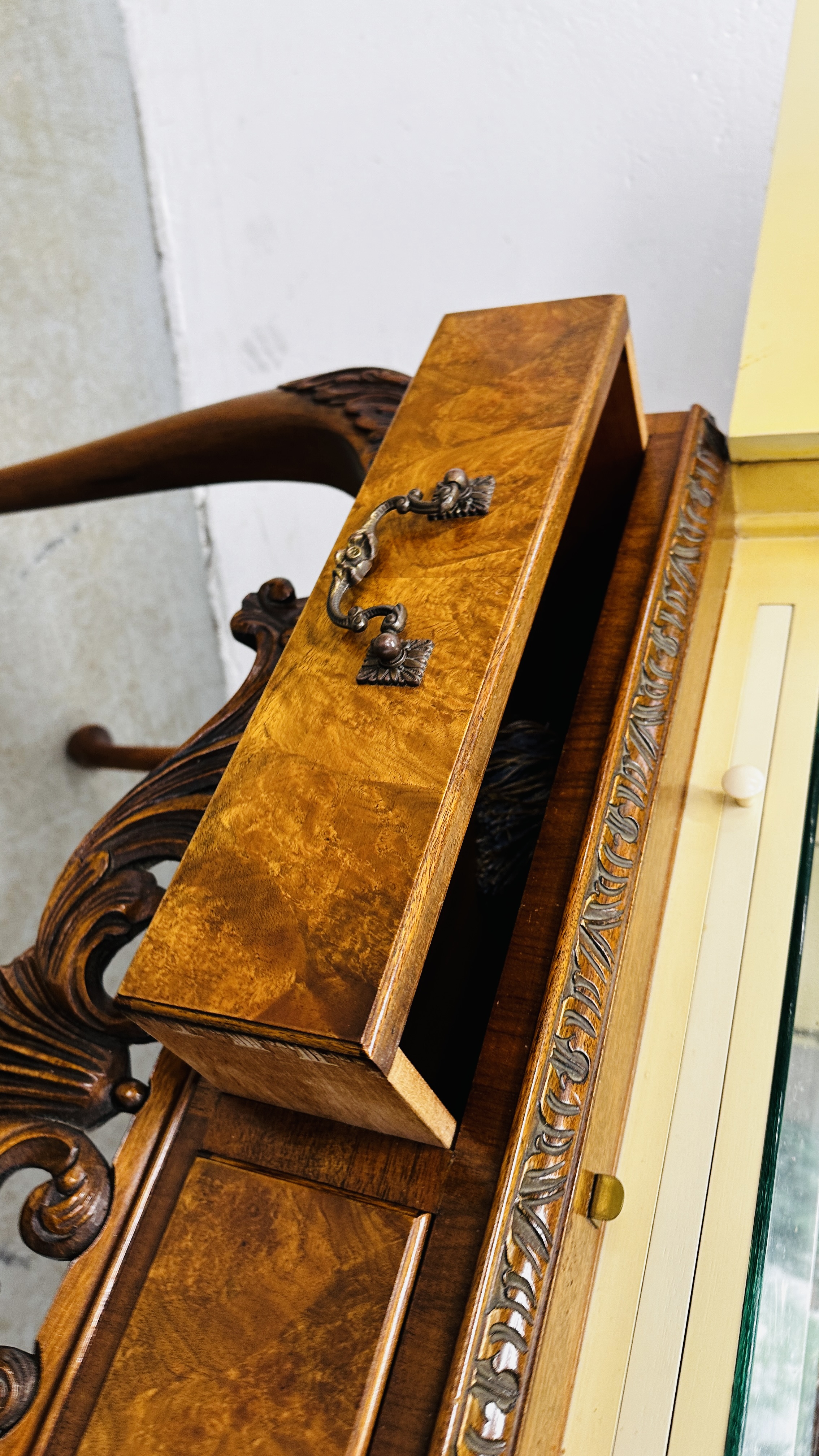 A CONTINENTAL STYLE REPRODUCTION WALNUT FINISH DRINKS CABINET WITH ORNATE BRASS EMBELLISHMENTS, - Image 17 of 22