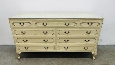 A CONTINENTAL DESIGN CREAM FINISH MULTI DRAWER CHEST, W 145CM X D 44CM X H 76CM.