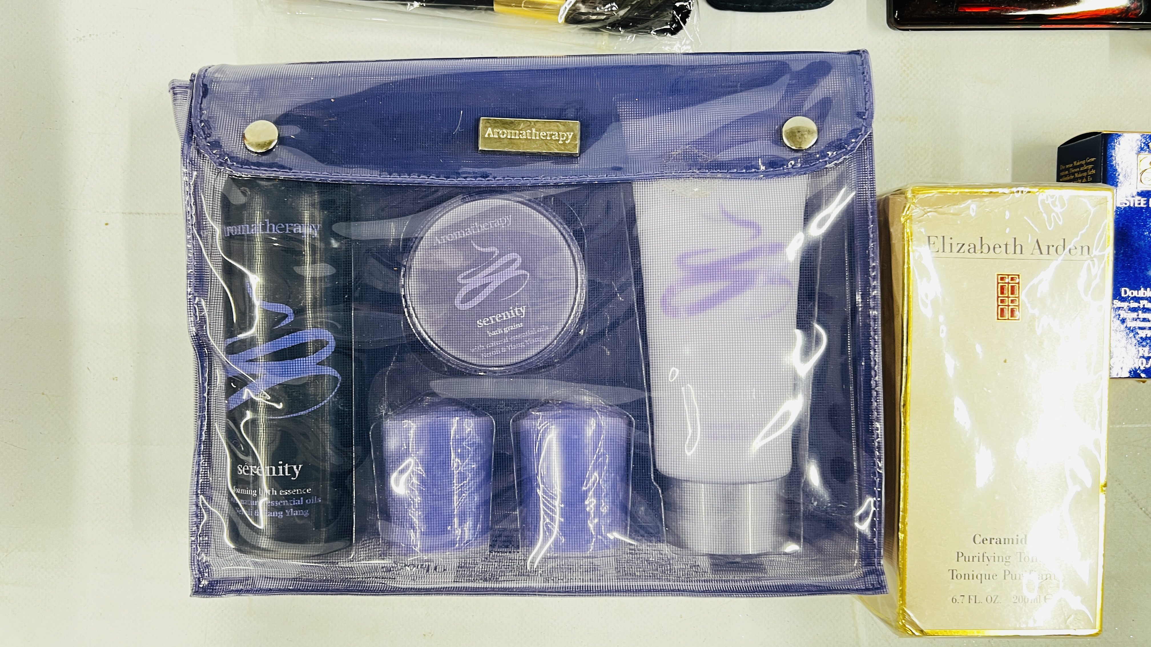 A BASKET CONTAINING A SELECTION OF BRANDED MAKE UP TO INCLUDE EXAMPLES MARKED ESTEE LAUDER AND - Image 2 of 6