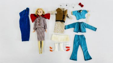 A VINTAGE THUNDERBIRDS LADY PENELOPE DOLL ALONG WITH A COLLECTION OF CLOTHING AND ACCESSORIES TO