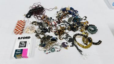 BOX OF MIXED COSTUME JEWELLERY TO INCLUDE MANY BEADED NECKLACES ETC.