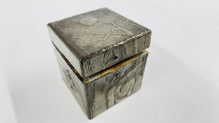 AN ARTS AND CRAFTS PEWTER BOX/CADDY INSET WITH A BLUE CABACHON (1 MISSING) DEPICTING A SEATED