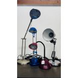 A GROUP OF FOUR ADJUSTABLE AND ANGLE POISED DESK LAMPS - SOLD AS SEEN.