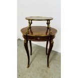 A REPRODUCTION ITALIAN STYLE GILT EMBELLISHED OVAL TWO TIER OCCASIONAL TABLE.