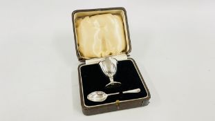 A VINTAGE CASED SILVER EGG CUP AND SPOON, LONDON ASSAY, MAKERS JOSIAH WILLIAMS.