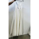 A "BIANCO EVENTO" WEDDING DRESS 40/L ALONG WITH TWO VEILS.