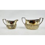 A VICTORIAN SILVER TWO HANDLED SUGAR BASIN AND CREAM JUG, SHEFFIELD 1889, MAKER HENRY HARRISON.