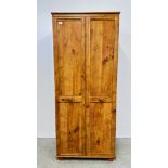 AN ALSTONS ORFORD PINE FINISH TWO DOOR WARDROBE W 78 X D 52.5 X H 184CM.
