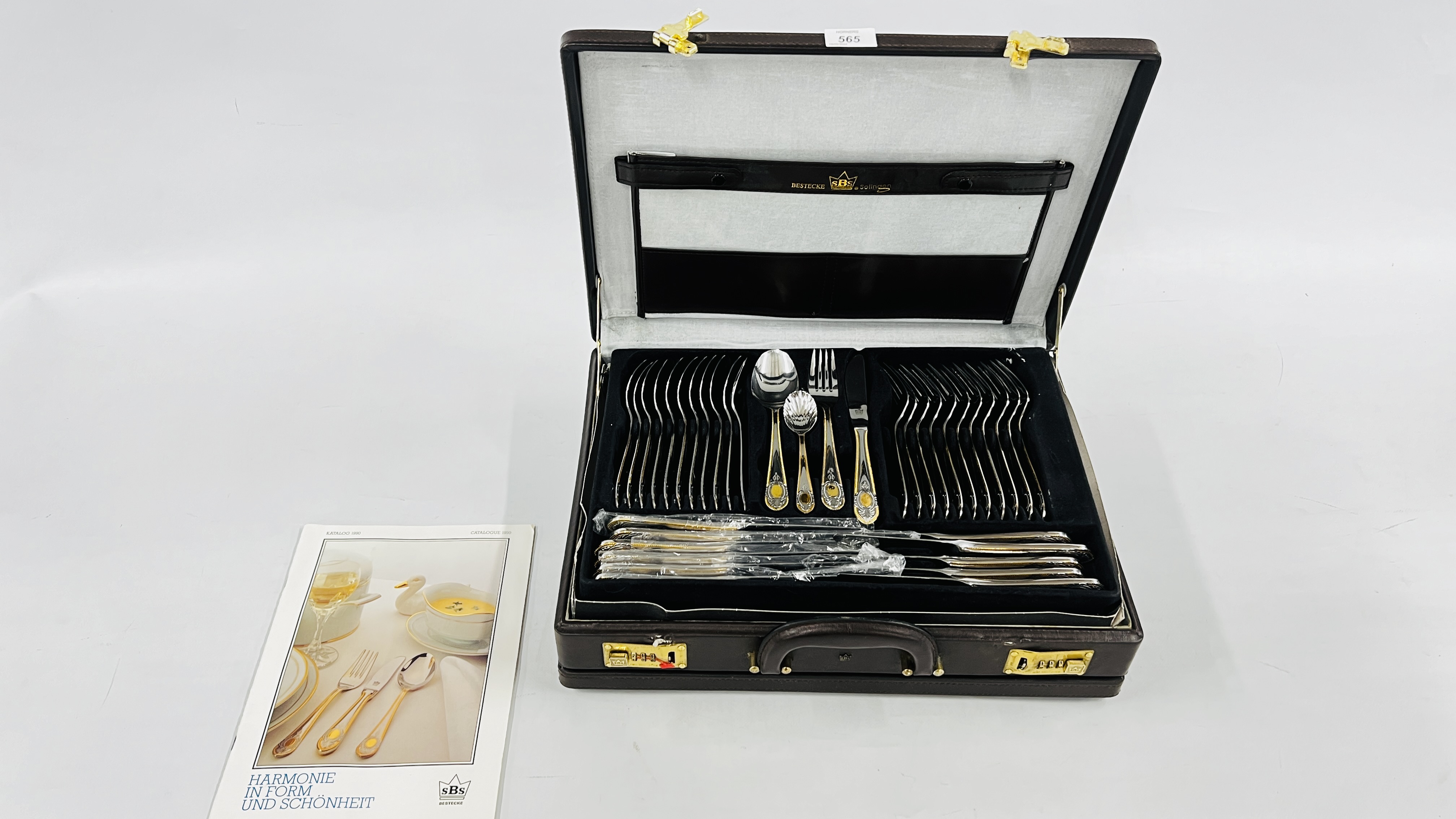 A CASED CANTEEN OF SBS SOLINGEN CUTLERY (12 PLACE SETTING).