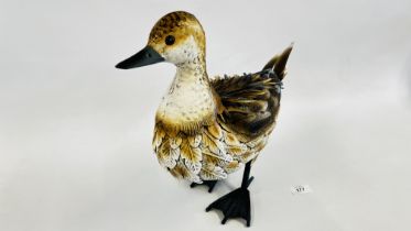 A METAL CRAFT DUCK.