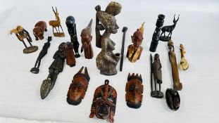 AN EXTENSIVE GROUP OF ETHNIC HARDWOOD CARVINGS TO INCLUDE BUSTS AND A SEATED NUDE ETC.