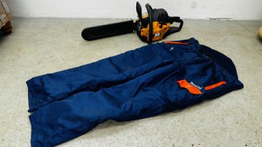 McCULLOCH MAC838 PETROL CHAIN SAW AND PAIR OF MAKITA CHAIN SAW PROTECTIVE TROUSERS SIZE XL.