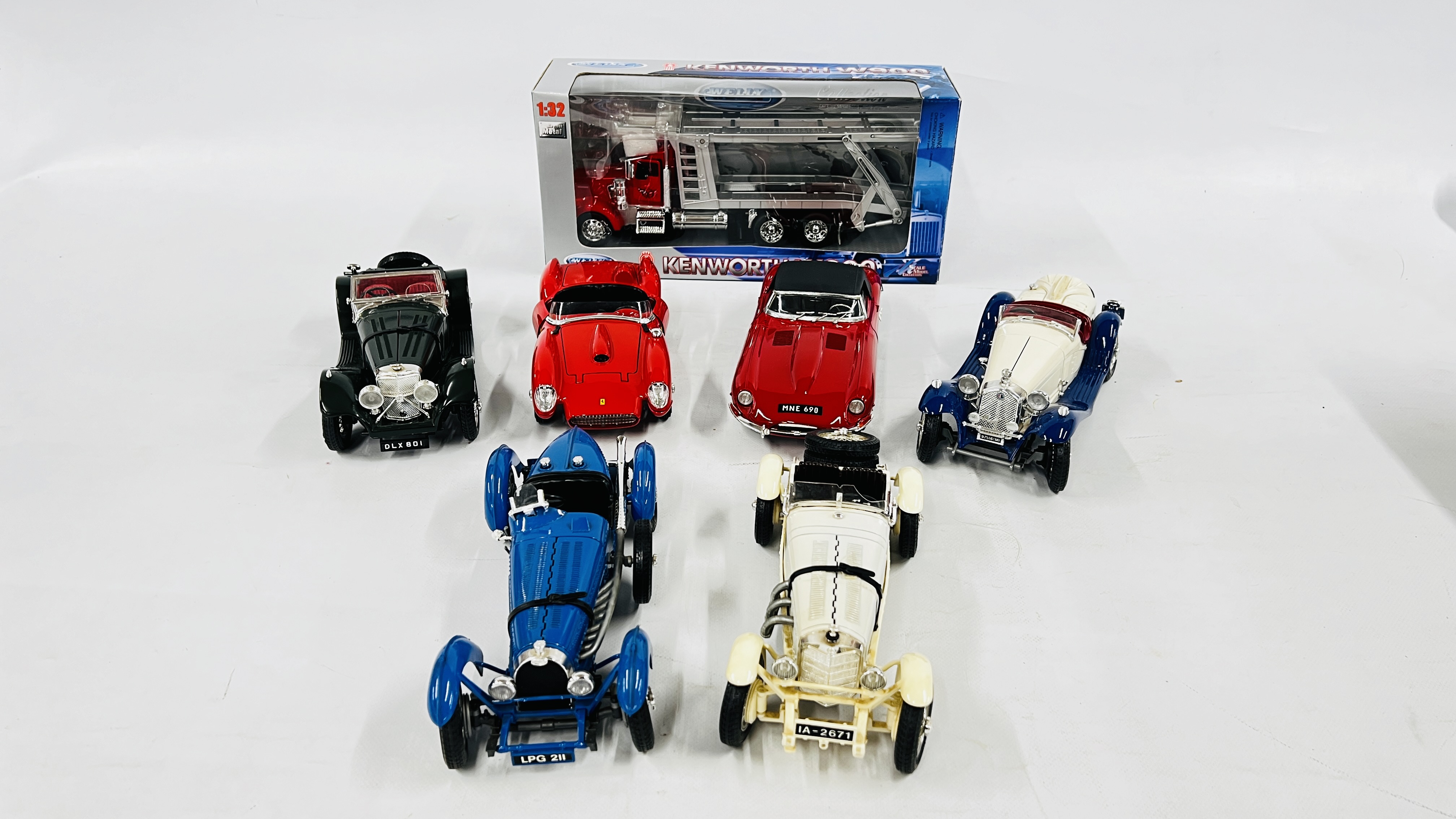 A GROUP OF 4 DIE-CAST BURAGO SALOON CARS AND A BURAGO FERRARI,