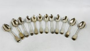 A GROUP OF 12 SILVER FIDDLE PATTERN DESSERT SPOONS, MAINLY LATE GEORGIAN EXAMPLES,