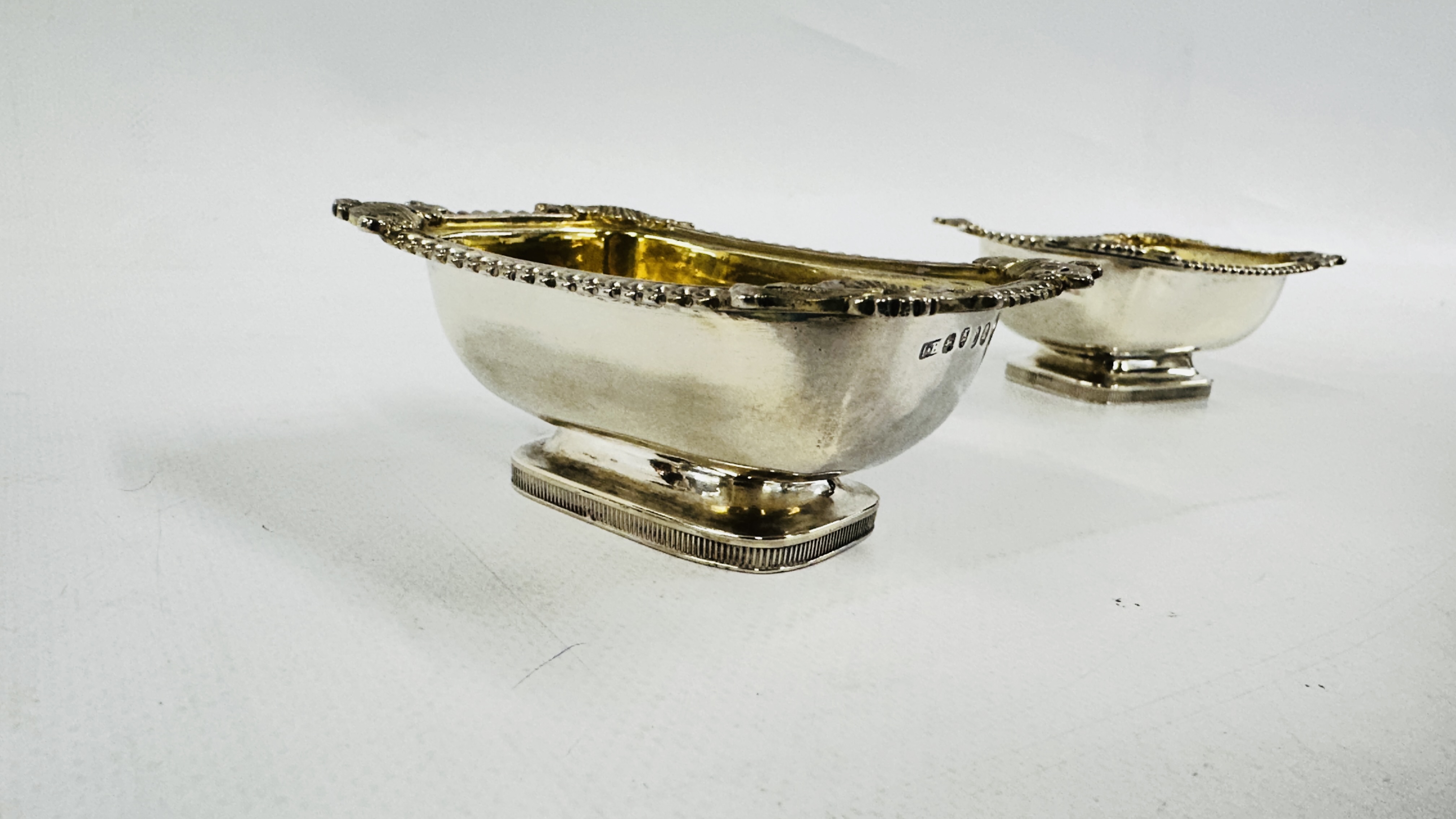 A PAIR OF GEORGE III SILVER SALTS LONDON ASSAY 1818, MAKER J. BIGGS L 9.8CM X W 7.3 X H 3CM. - Image 10 of 16