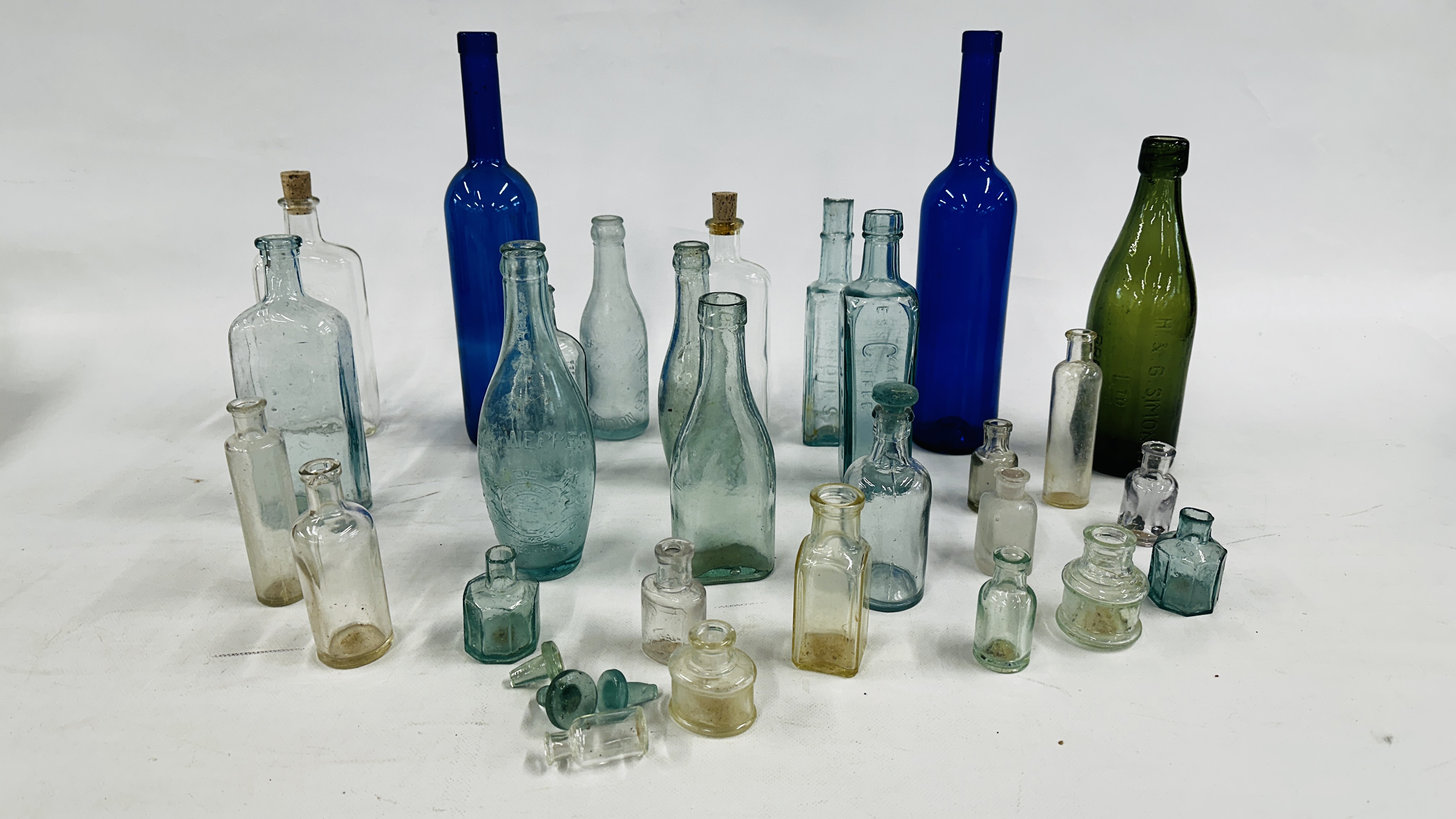 LARGE GROUP OF ANTIQUE AND VINTAGE APOTHECARY + ADVERTISING BOTTLES.