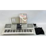 A YAMANA PSR295 ELECTRONIC KEYBOARD WITH COVER AND POWER TRANSFORMER - SOLD AS SEEN.