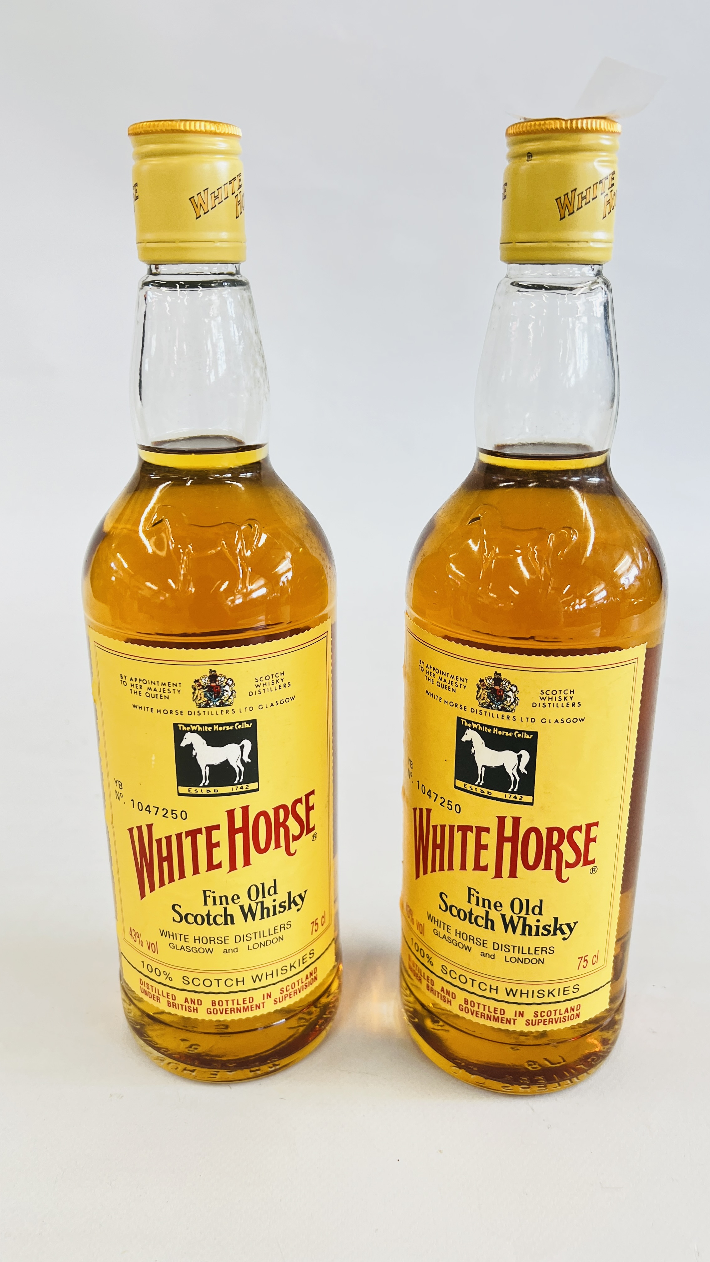 2 X 75CL BOTTLES OF "WHITE HORSE" FINE OLD SCOTCH WHISKY.