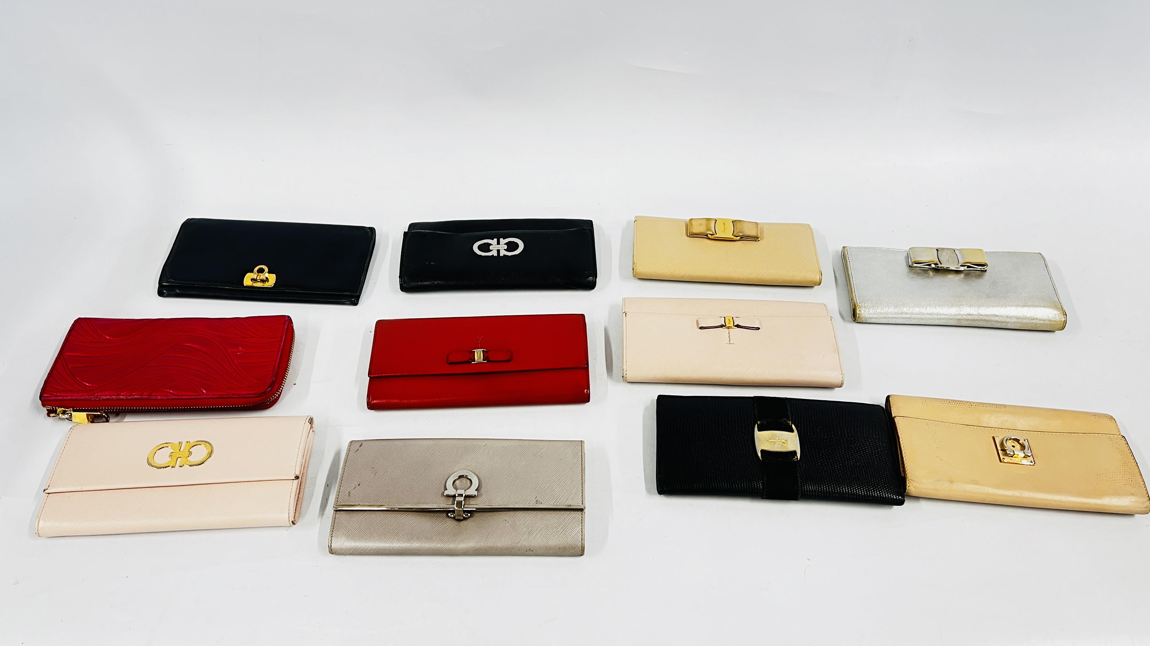 A COLLECTION OF 11 DESIGNER PURSES MARKED "SALVADOR FERRAGAMA".