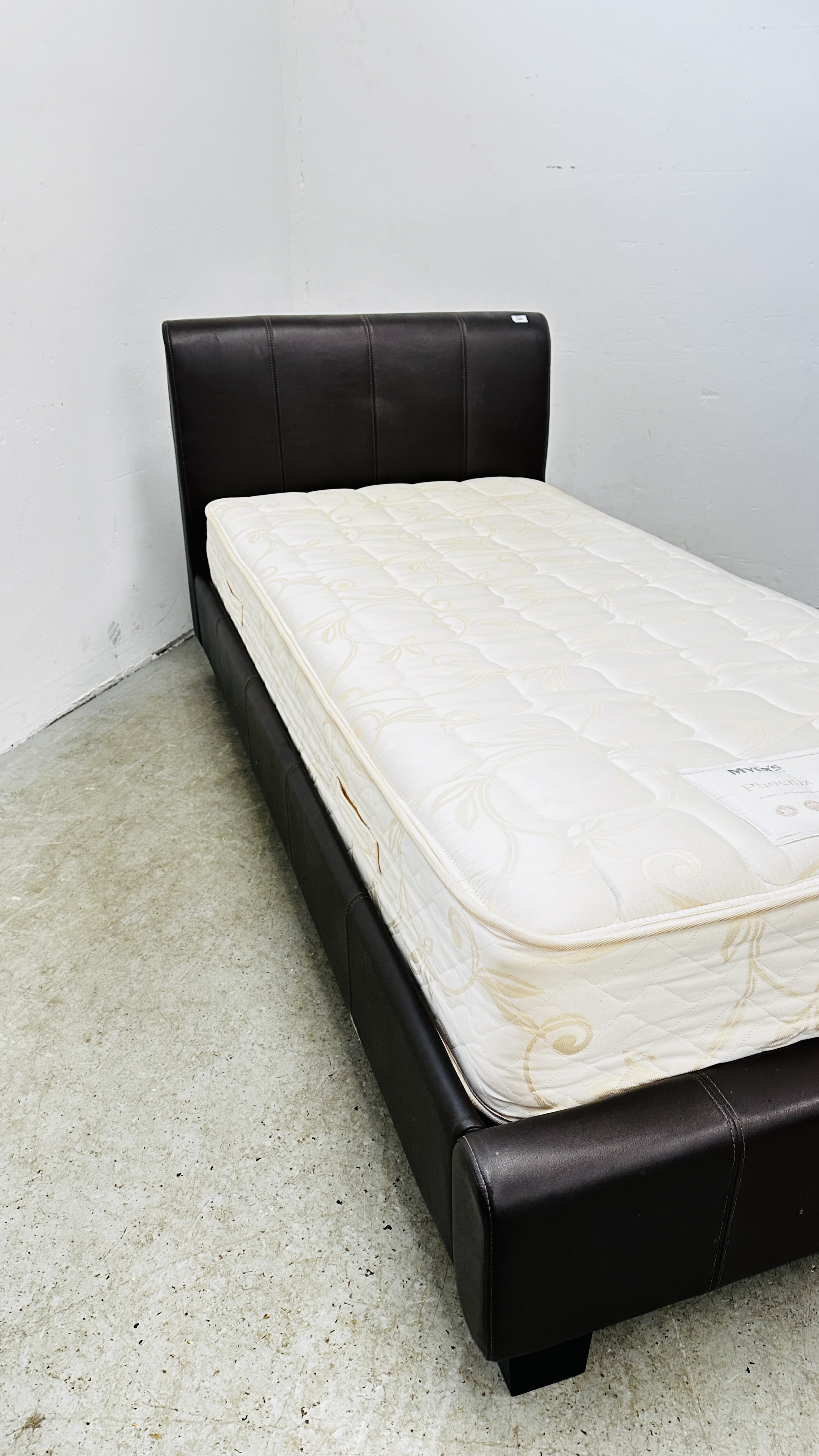 A DARK TAN FAUX LEATHER SINGLE BEDSTEAD WITH MYERS PHOENIX MATTRESS. - Image 13 of 13