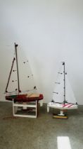 TWO RC SAILING BOATS ON STANDS (NO CONTROLLER).