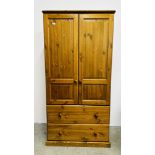 A SOLID PINE TWO DRAWER DOUBLE WARDROBE, W 90CM X D 53CM X H 179CM.