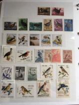 A COLLECTION OF BIRD THEMATICS IN TWO VOLUMES, MANY SETS INCLUDING COMMONWEALTH DEFINITIVES,